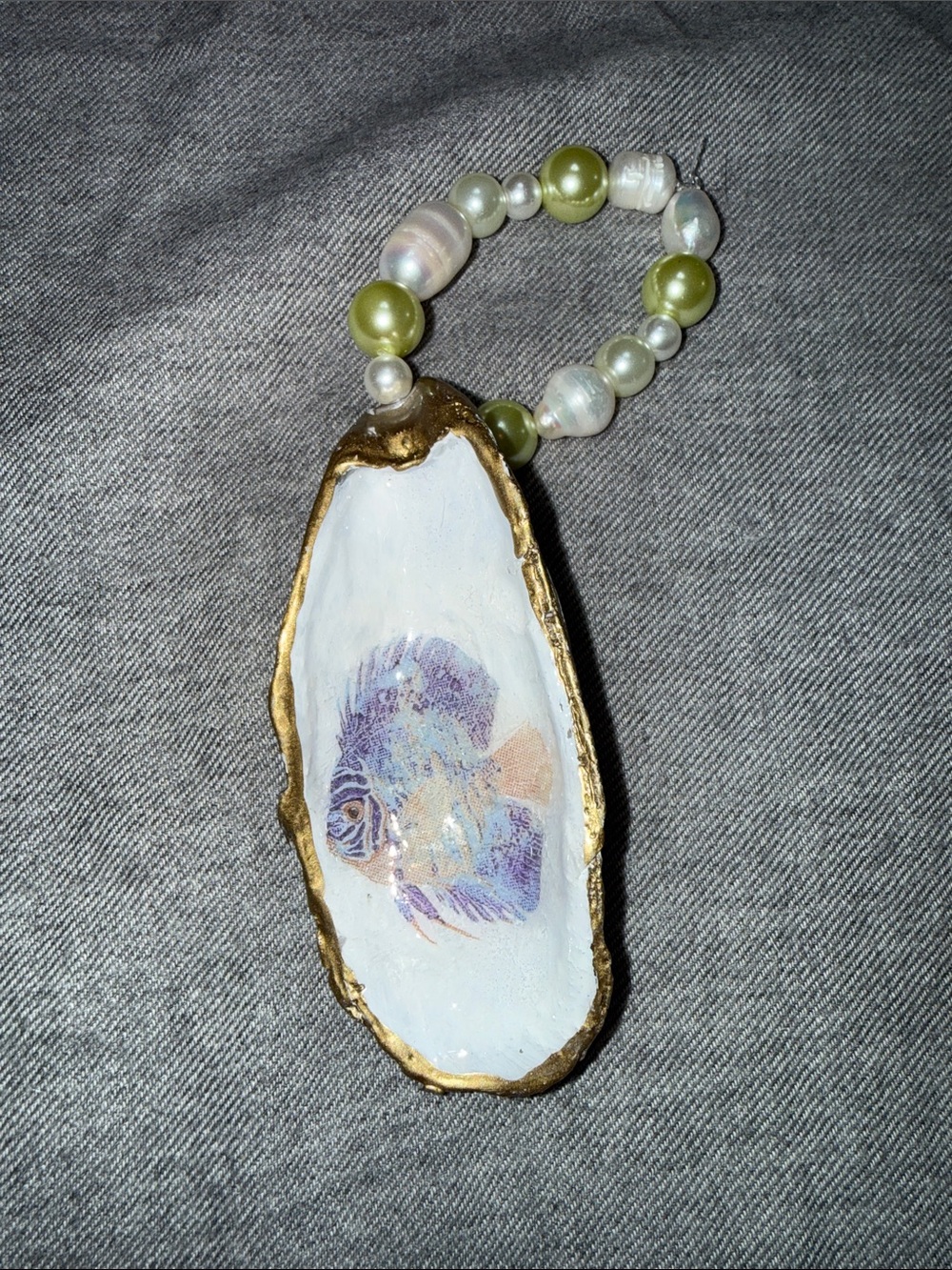 Handcrafted White and Gold Shell Ornament with Green Pearl Bead Loop